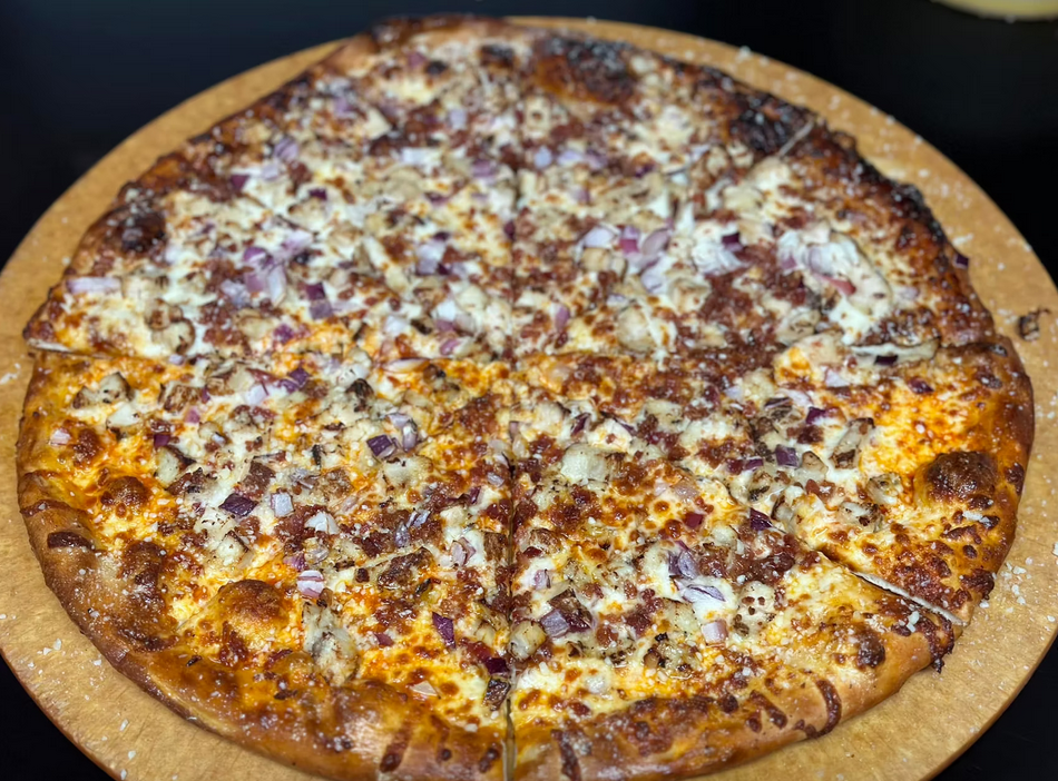 A pie coming off the wood peel